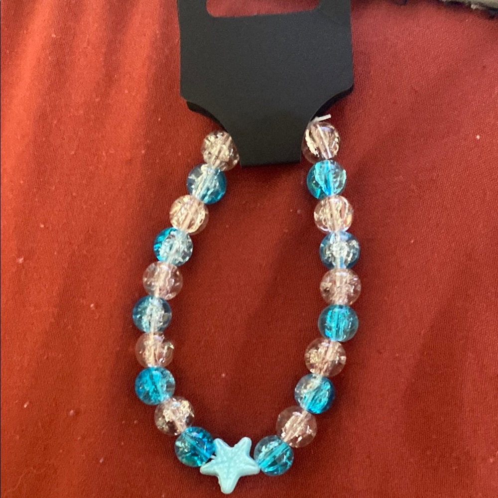 Blue and Clear Beaded Bracelet with Star Charm